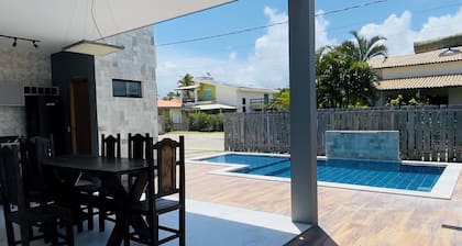 Exclusive paradise, House in a beachfront condominium.
