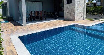 Exclusive paradise, House in a beachfront condominium.