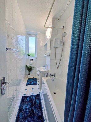 Hair dryer, towels, soap, toilet paper