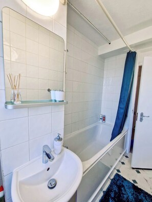 Hair dryer, towels, soap, toilet paper
