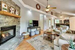 TV, fireplace, books