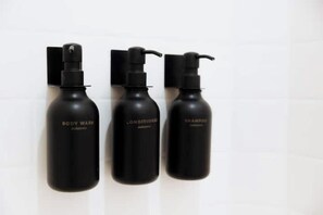 Hair dryer, towels, soap, shampoo