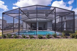Outdoor pool, a heated pool - Spacious 7BR House in FABULOUS Davenport Resort w/ Fitness room and Lazy River (Davenport)