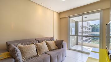 Apartamento básico | Área de estar | TV