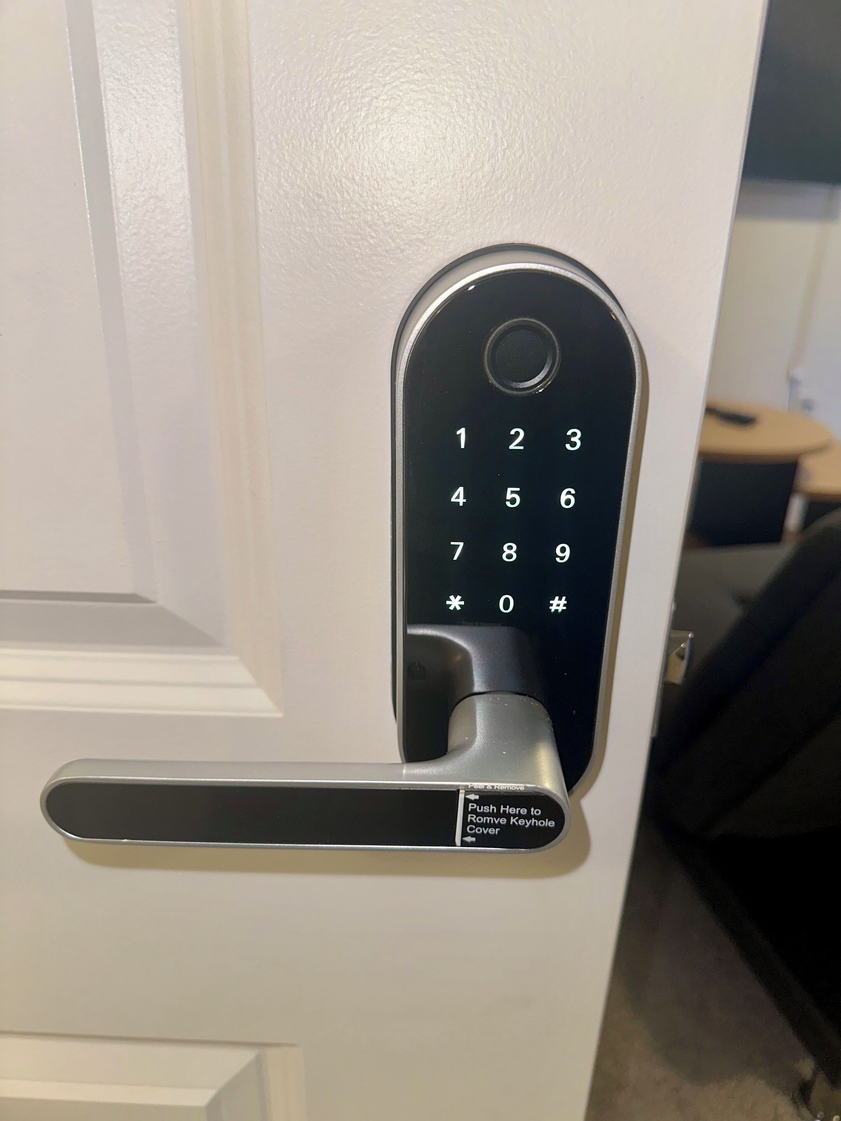 A door with a numeric keypad lock.