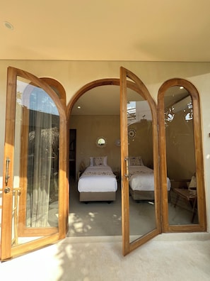 Premium bedding, blackout curtains, free WiFi, bed sheets