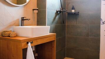 Deluxe Apartment, Hill View | Bathroom | Shower, hair dryer, slippers, towels
