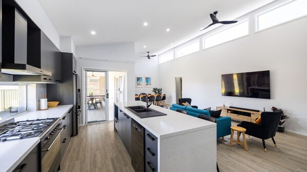 Dishwasher, coffee/tea maker, dining tables