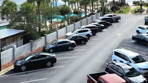 A parking lot with cars and a view of the ocean. - Vacation Destination (Myrtle Beach)