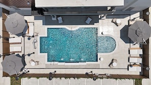 Seasonal outdoor pool, open 8:00 AM to 10:00 AM, pool umbrellas