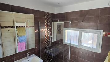 Shower, hair dryer, towels, soap