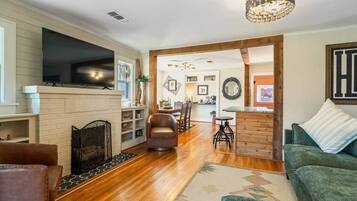 TV, fireplace, books, offices