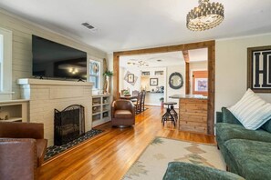 TV, fireplace, books, offices