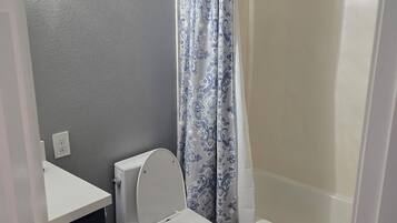 Hair dryer, towels, soap, toilet paper