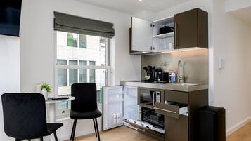 Fridge, microwave, dishwasher, coffee/tea maker