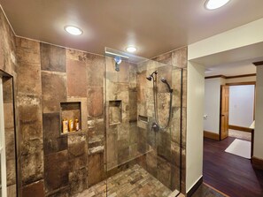 Shower, towels, soap, toilet paper