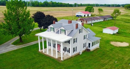 Historic 1800s Farmhouse • Sleeps 20 • 16-Acre Retreat in Lisbon, OH