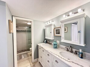 Shower, hair dryer, towels