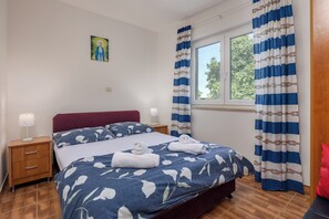 1 dormitorio, tabla de planchar con plancha, wifi gratis y ropa de cama