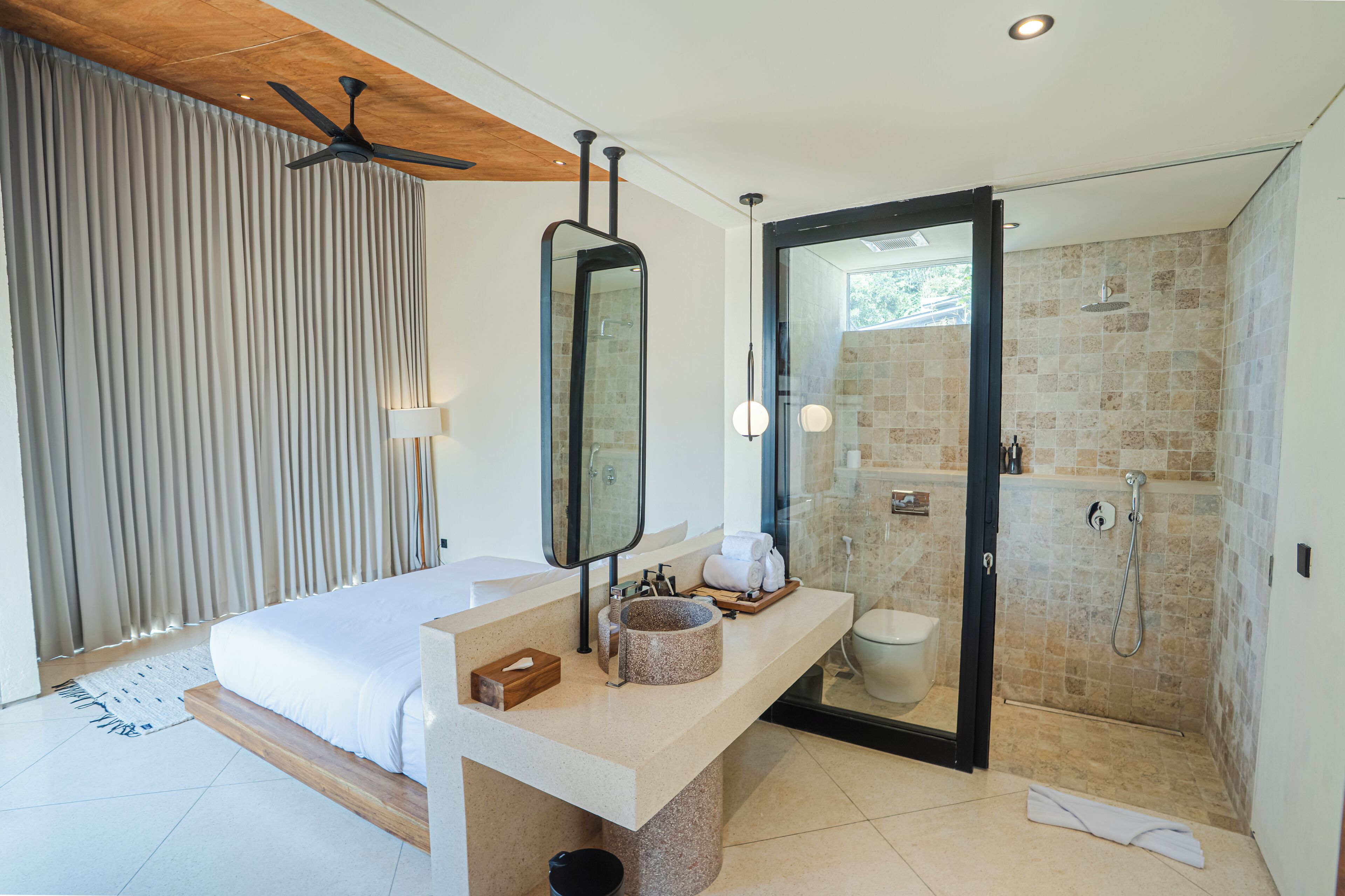 Separate bathtub and shower, free toiletries, hair dryer, bathrobes