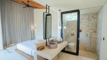 Separate bathtub and shower, free toiletries, hair dryer, bathrobes