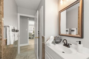 Shower, towels, soap, toilet paper