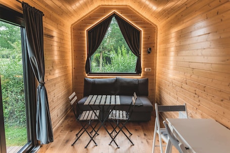 Living area. Charm House by Tiny Away