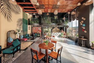 Twin Room, Pool View | Minibar, desk, soundproofing, iron/ironing board