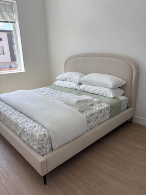 Iron/ironing board, travel crib, free WiFi, bed sheets