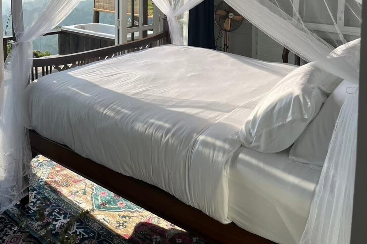 Panoramic Suite, Hot Tub, Mountain View | Premium bedding, minibar, in-room safe, individually decorated