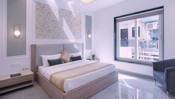 Habitación superior | Edredones de plumas, minibar, escritorio y wifi gratis