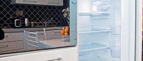 Réfrigérateur, four, plaque de cuisson, lave-vaisselle