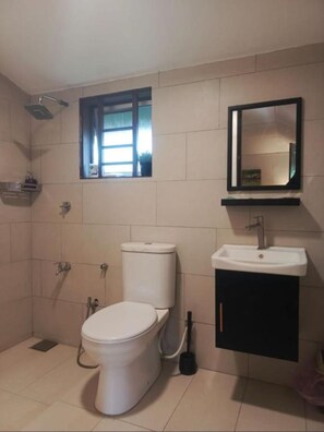 Shower, hair dryer, towels, soap