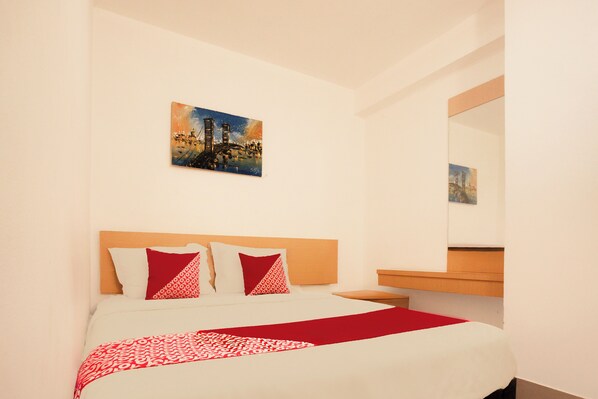 Standard Double Room | Bed sheets - Collection O Palembang near Palembang Indah Mall formerly Hostel 77 Smart (Palembang)