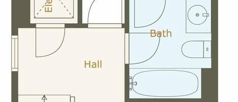 A floor plan of a hotel with a bedroom, bathroom, hall, and laundry area.