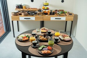 Daily buffet breakfast (EUR 18 per person)