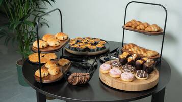 Daily buffet breakfast (EUR 18 per person)