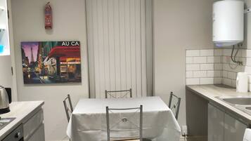 Microwave, oven, electric kettle, dining tables