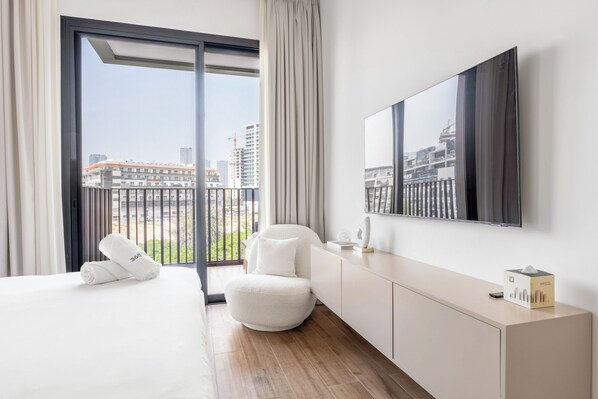 Apartamento superior | Cofres nos quartos, cortinas blackout, ferros/tábuas de passar roupa