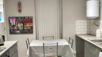 Microwave, oven, electric kettle, dining tables