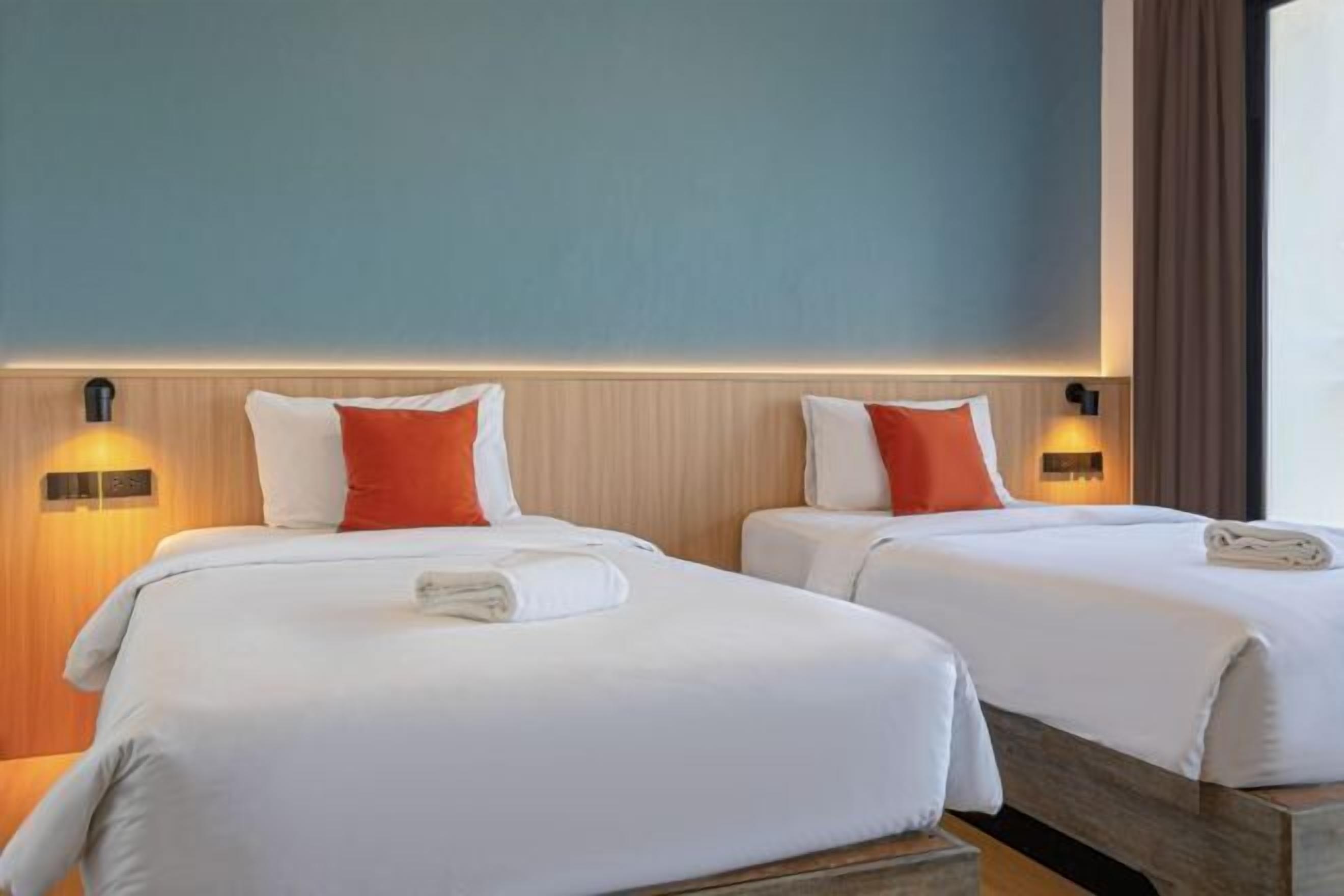 客房内保险箱、办公桌、遮光窗帘、免费 WiFi