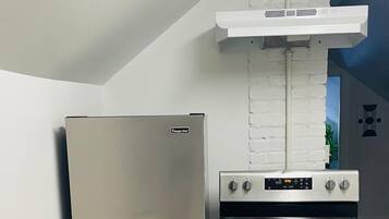 Fridge, coffee/tea maker, toaster, cookware/dishes/utensils