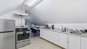 Fridge, coffee/tea maker, toaster, cookware/dishes/utensils