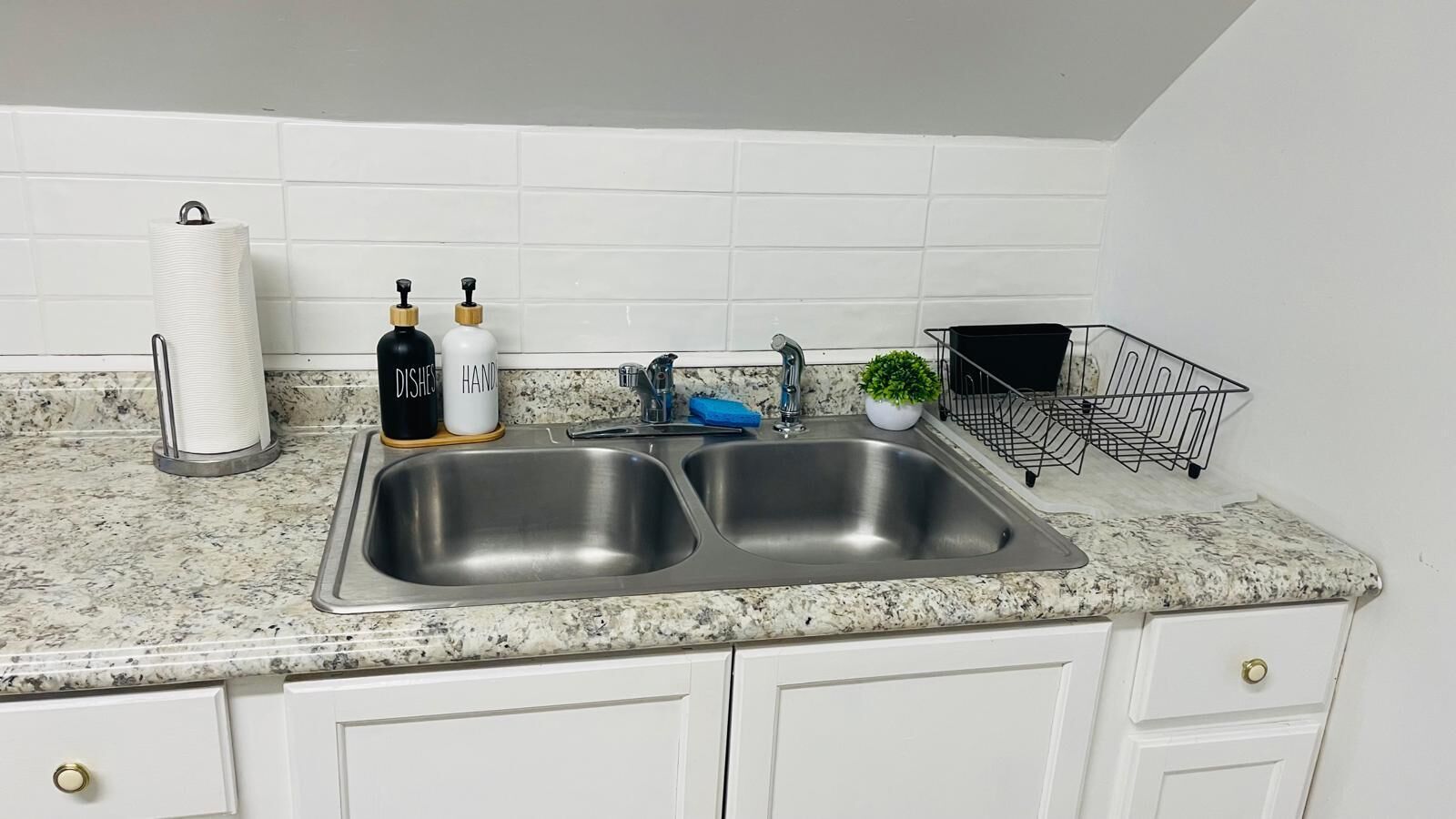 Fridge, coffee/tea maker, toaster, cookware/dishes/utensils