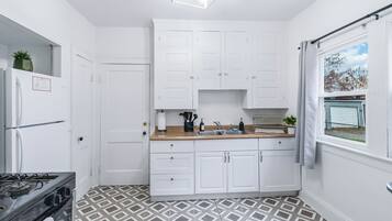 Fridge, microwave, coffee/tea maker, toaster