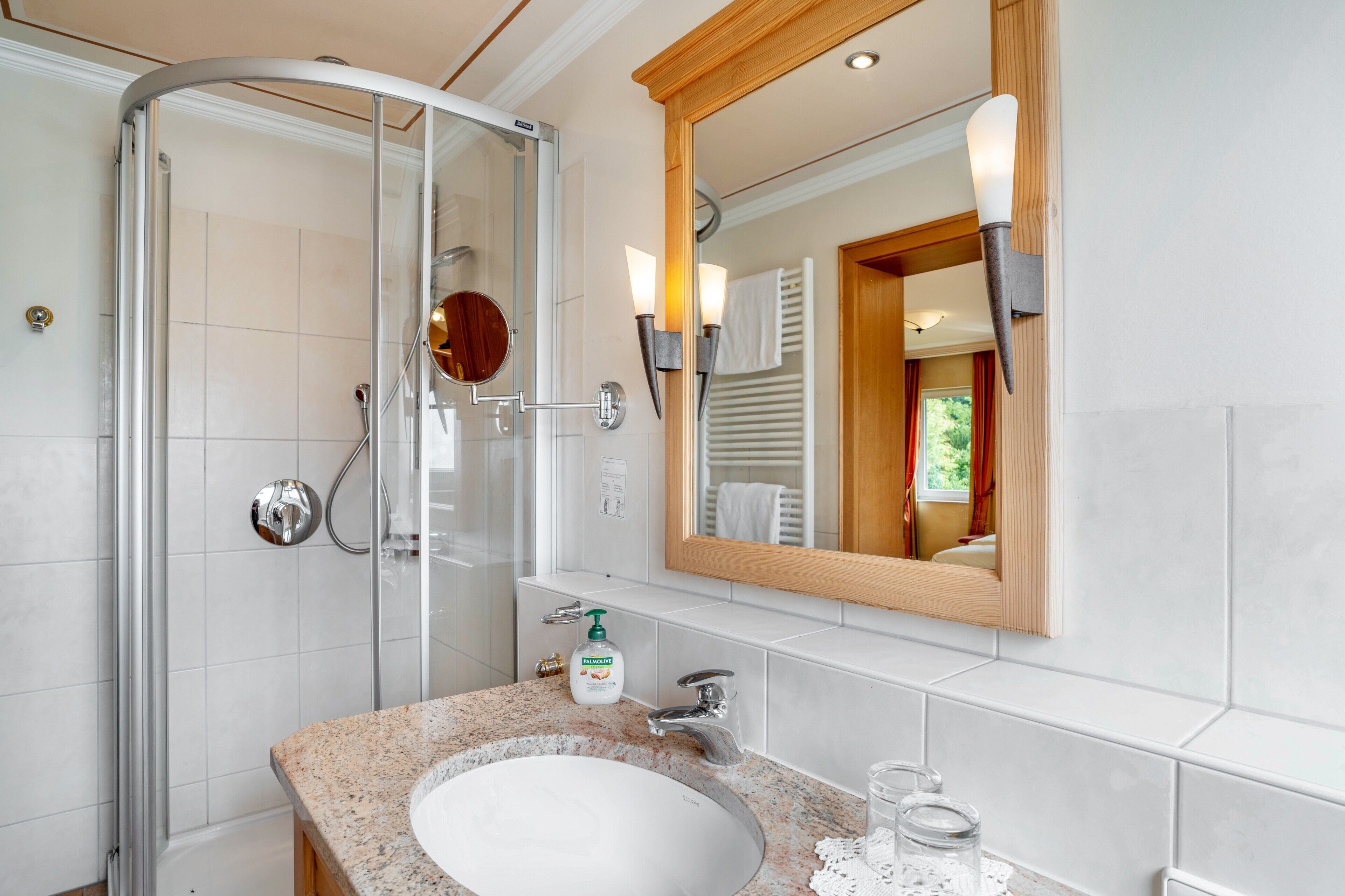 Shower, hair dryer, towels