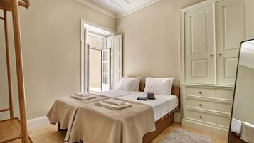 2 dormitorios, tabla de planchar con plancha, wifi gratis y ropa de cama