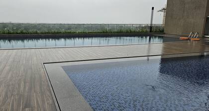 Chic 2-bedroom apartment with fitness room and AC in marvelous GIFT CITY.