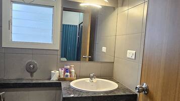 Shower, bidet, towels, soap