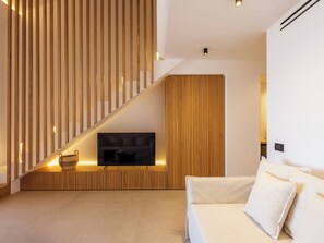 Dúplex de lujo, patio, vista al lago | Área de sala de estar